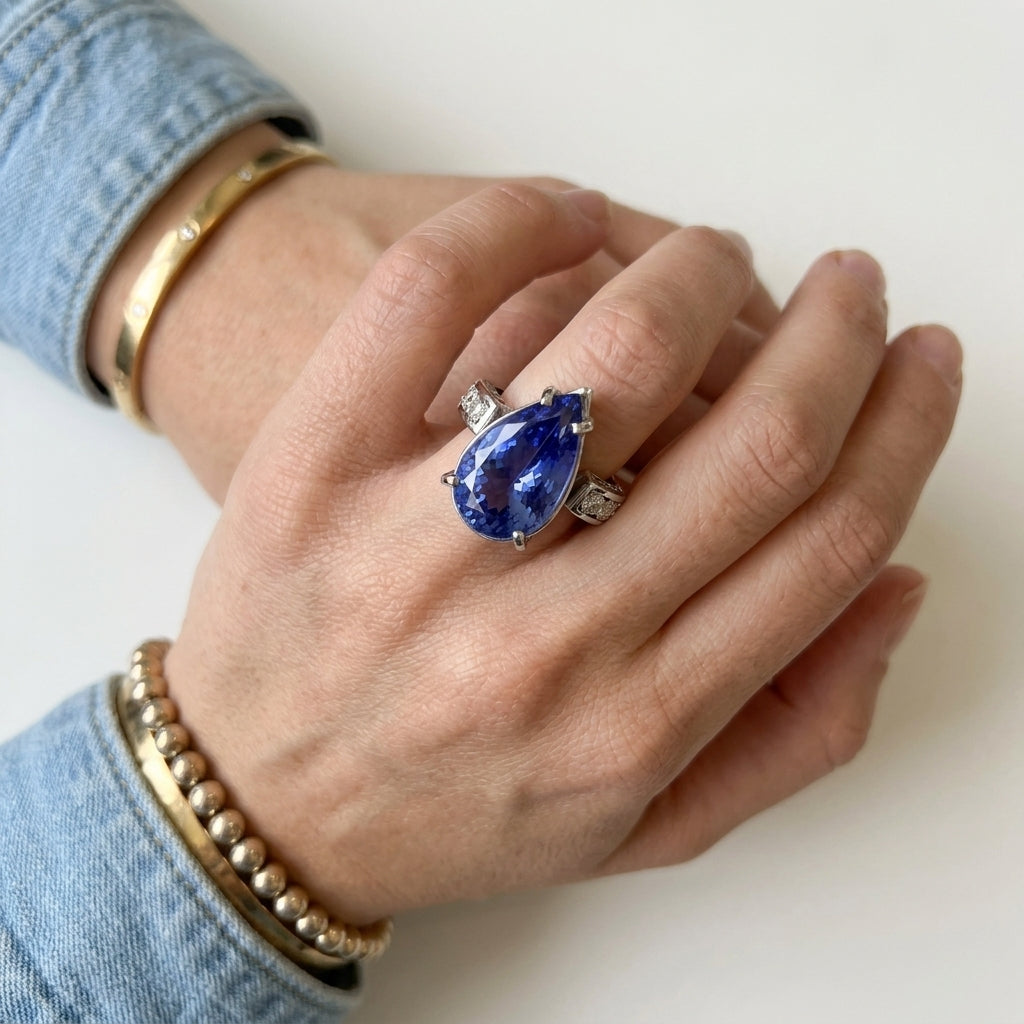 Tanzanite 11.61ct tw Ring with 0.65ct tw diamonds in 14kt Gold