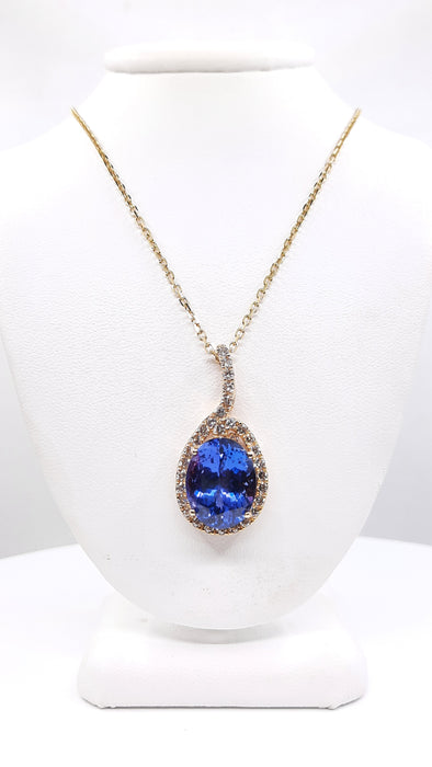 Tanzanite 13.05ct tw Pendant with 1.50 Diamonds in 14kt Gold