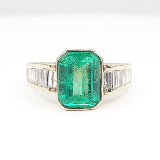 Emerald 4.50ct tw and Diamond 0.90ct tw Women's Ring 14kt Gold