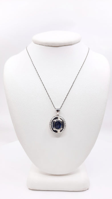 Sapphire 0.70 cttw Pendant with Diamonds 0.20 cttw in 14kt Gold