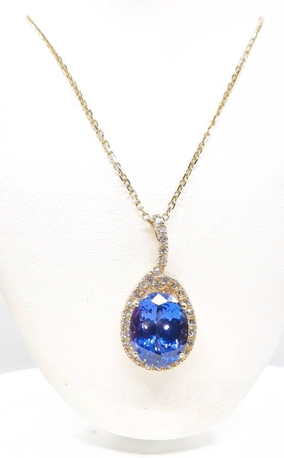 Tanzanite 13.05ct tw Pendant with 1.50 Diamonds in 14kt Gold